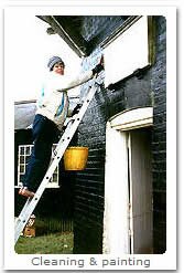 Gill is washing the sign at the entrance